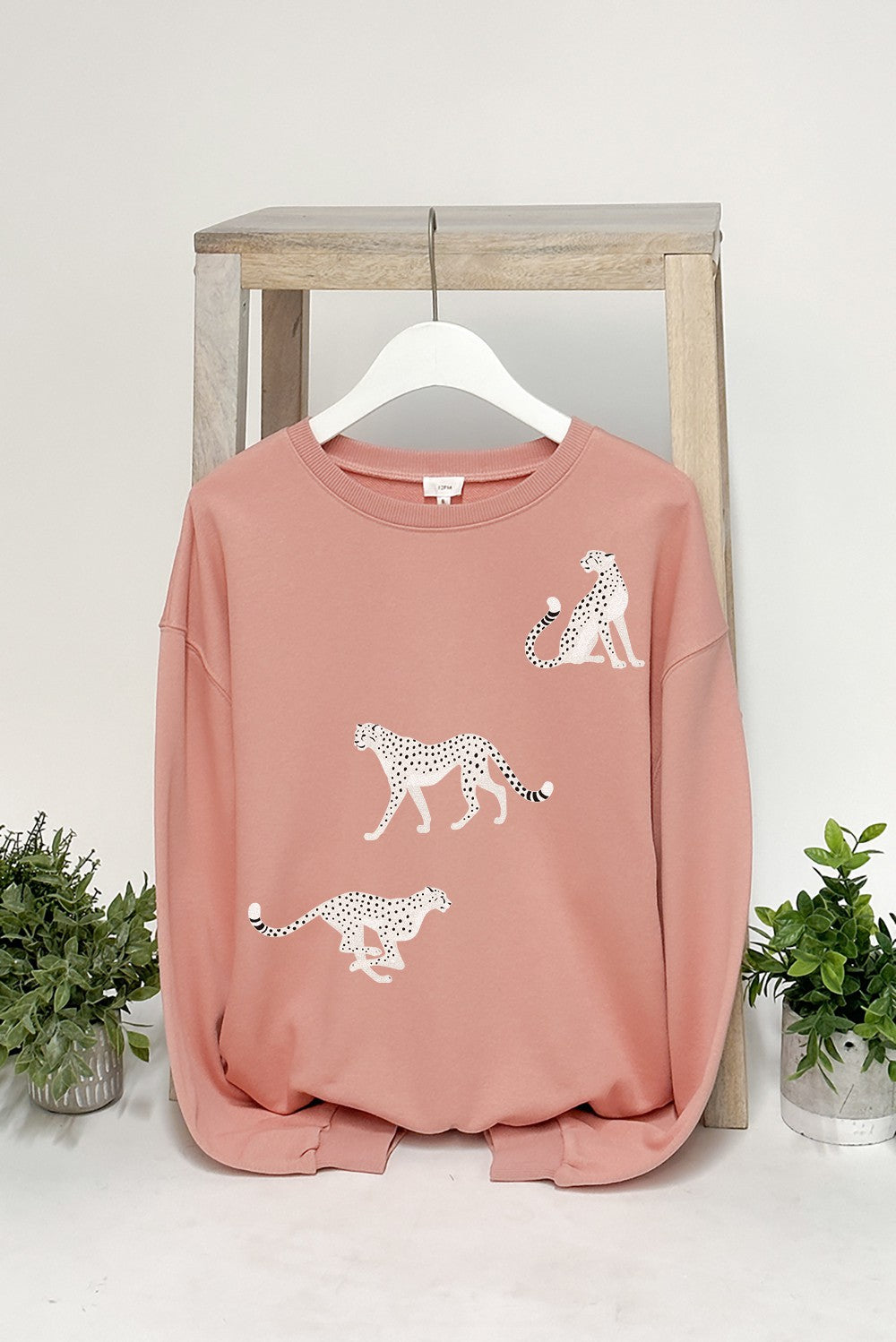 
                  
                    White Cheetahs Sweatshirt Pullover Sweater
                  
                